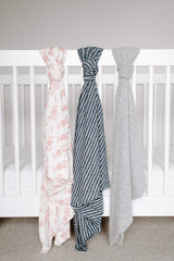 aden + anais Snuggle Knit stroller cover providing privacy and shade on walks