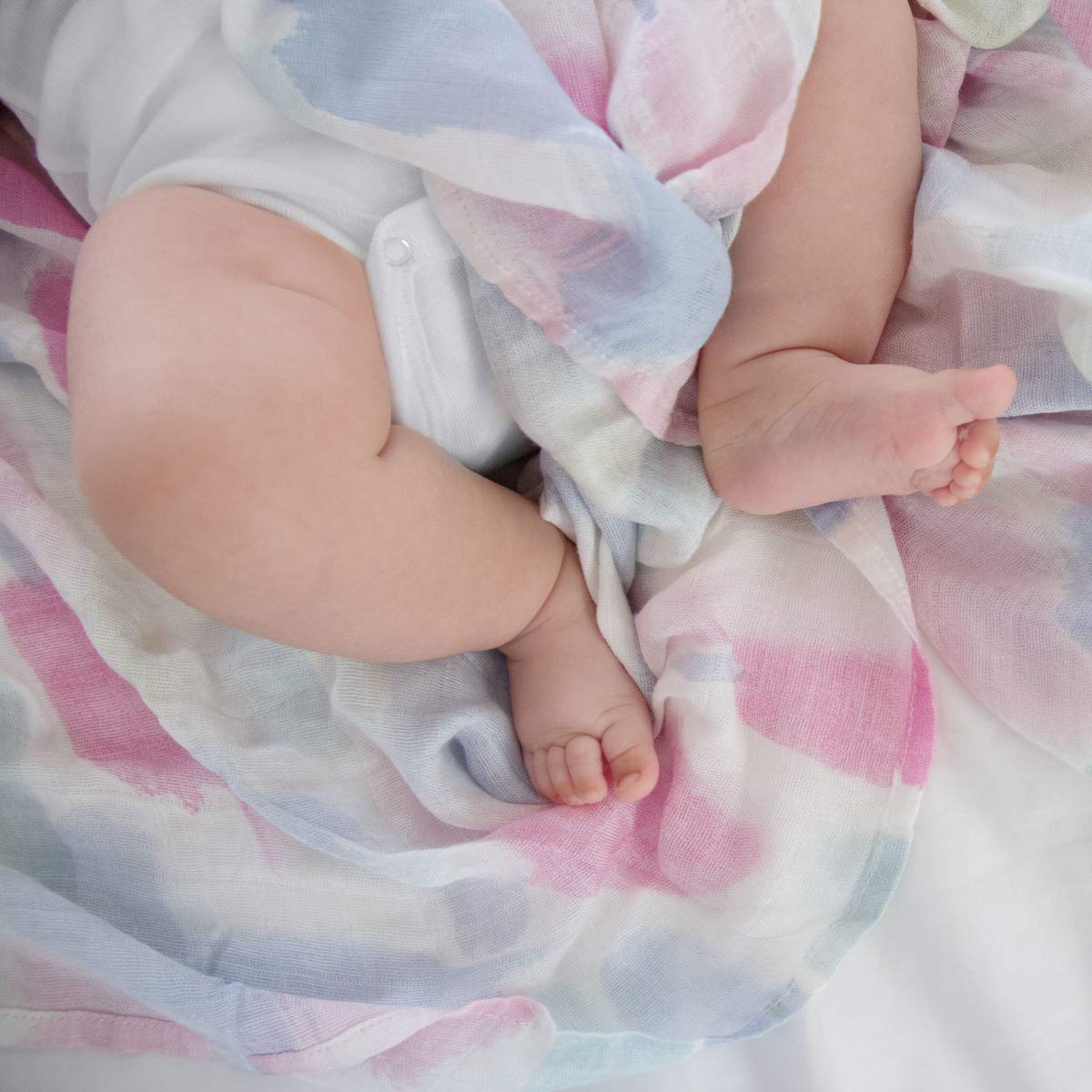 aden + anais Nursery scene showing swaddle as stroller cover