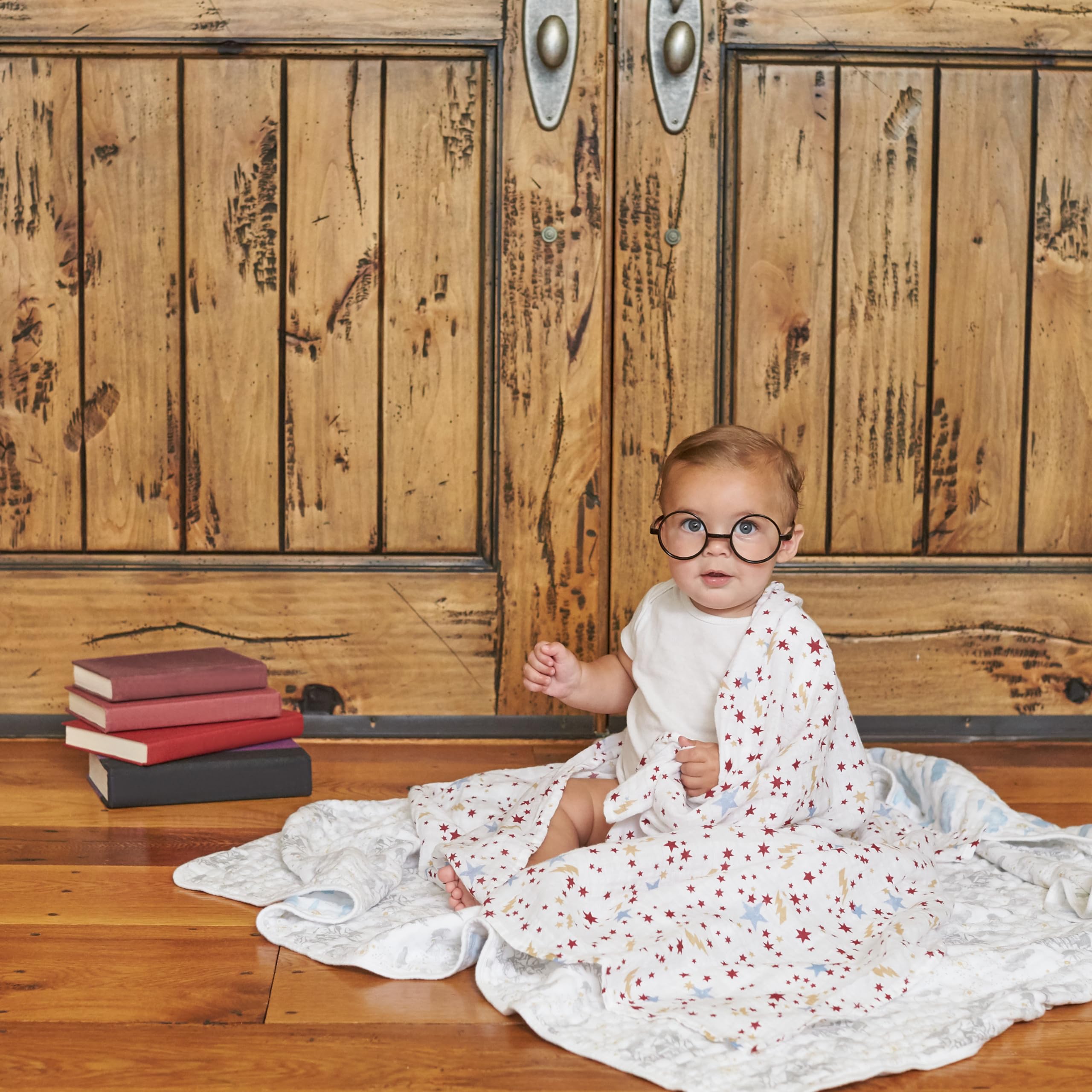 aden + anais swaddle blanket used as a receiving blanket or stroller cover
