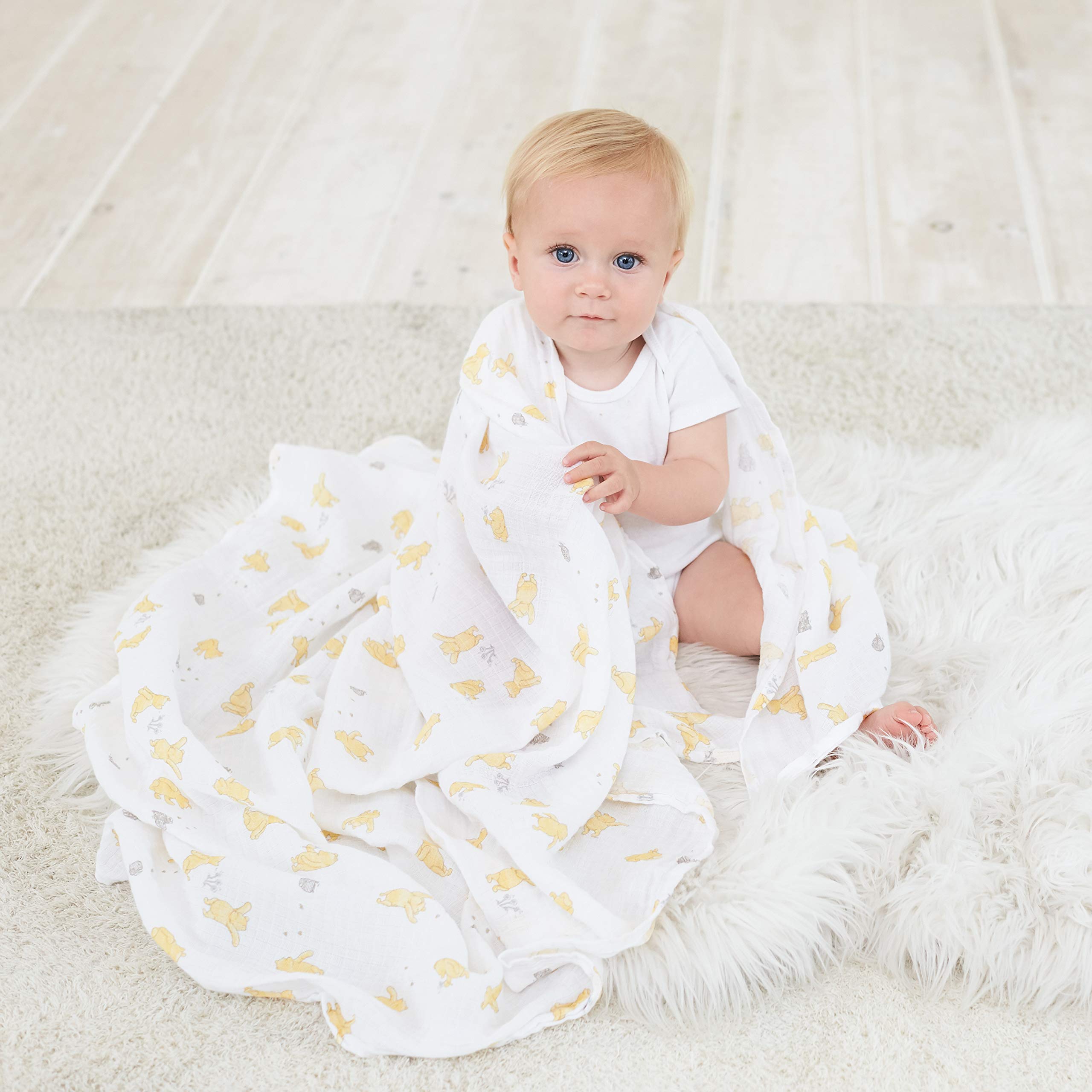 aden + anais Winnie and Friends swaddle gift set displayed for newborns