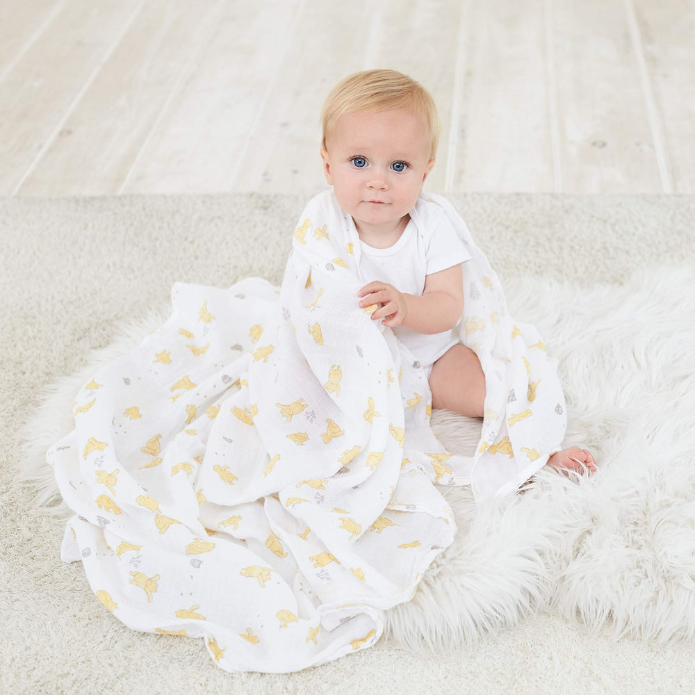 aden + anais Winnie and Friends swaddle gift set displayed for newborns