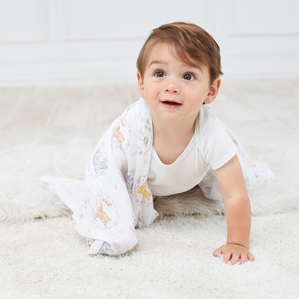 aden + anais swaddle in use as nursery cover demonstrates lightweight convenience
