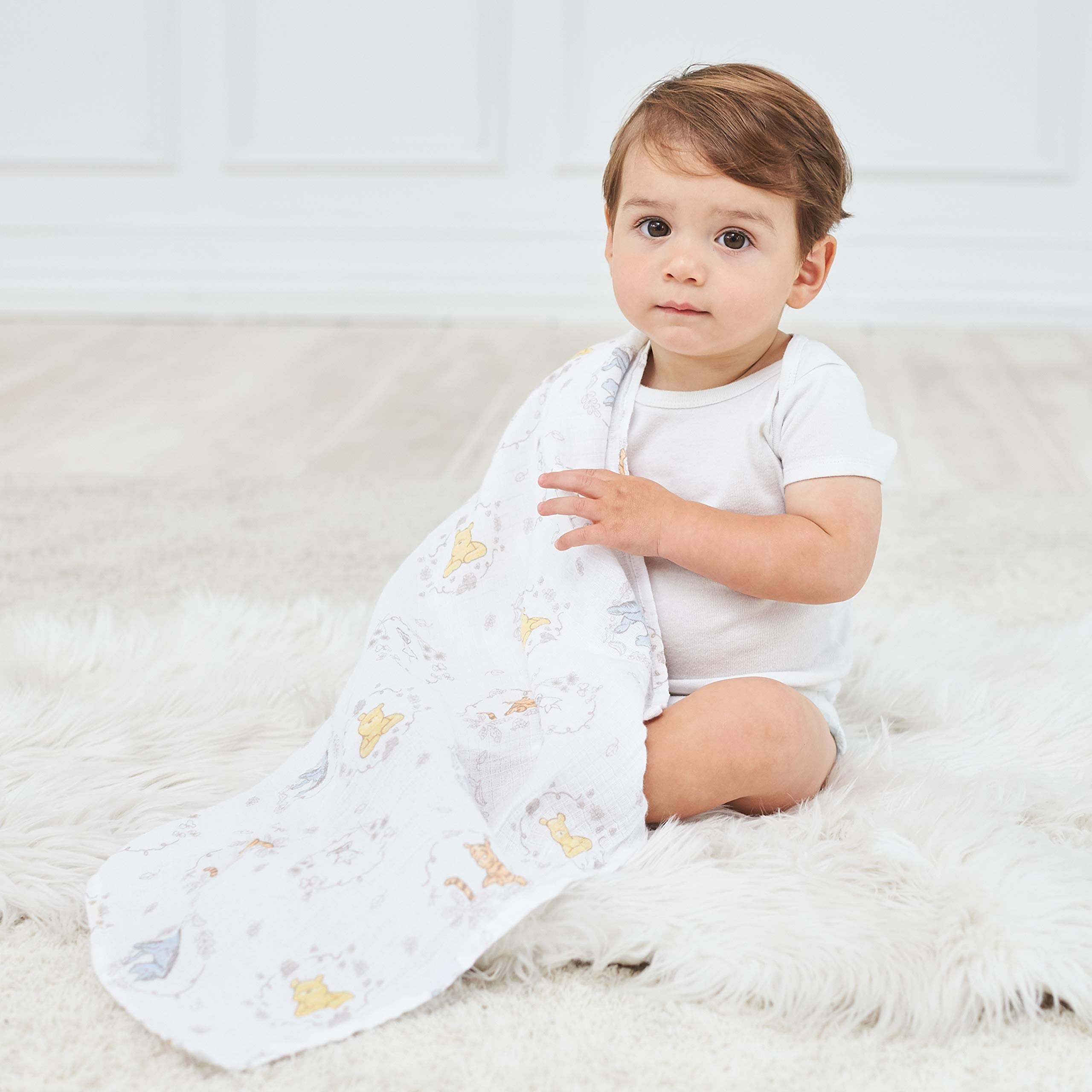 aden + anais Winnie and Friends swaddle pack showcased as a versatile multi-pack