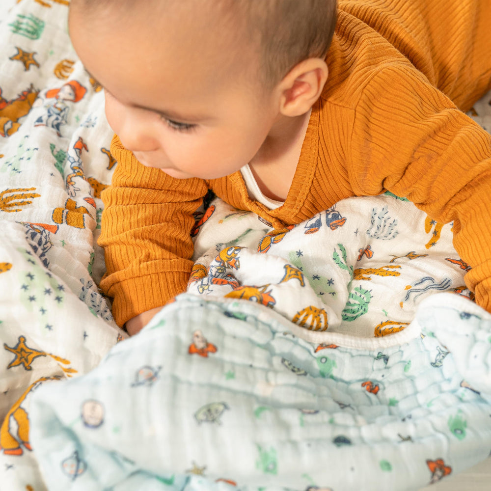 aden-anais Woody and Friends blanket gift-ready sits nicely for baby showers.