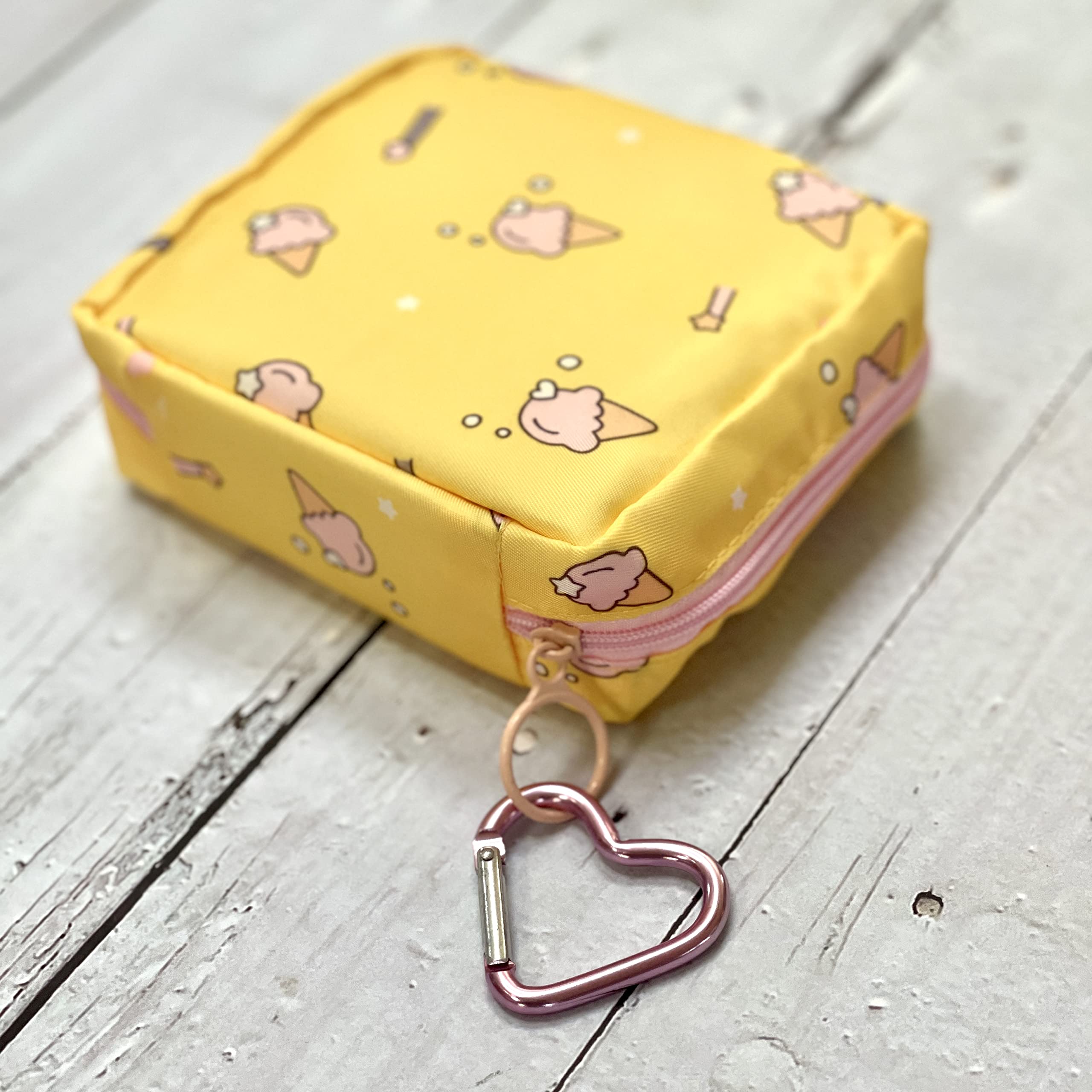 Zippered closure keeps contents safe and organized in your bag.