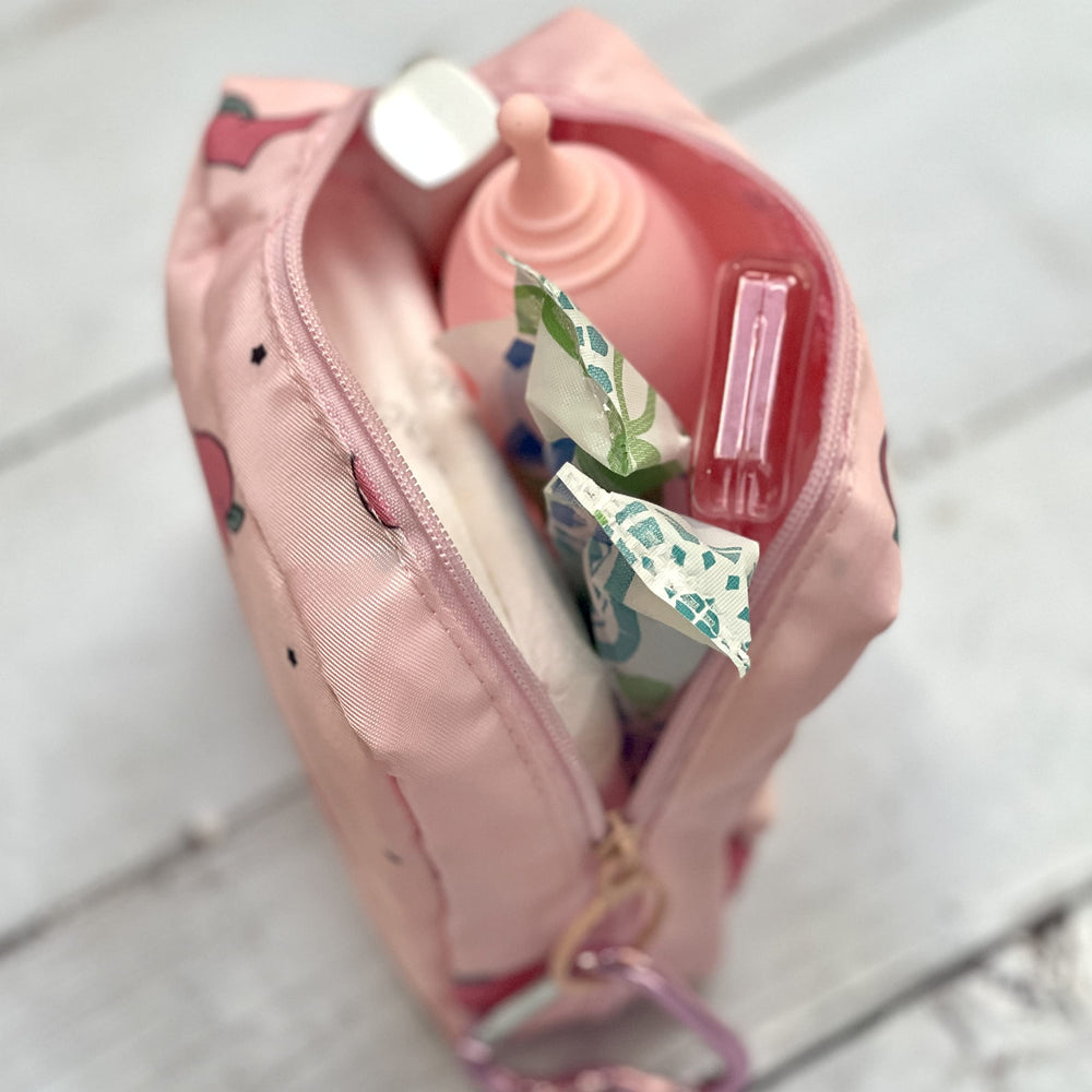 Adorable Pink Peri compact travel-friendly bag fits purses