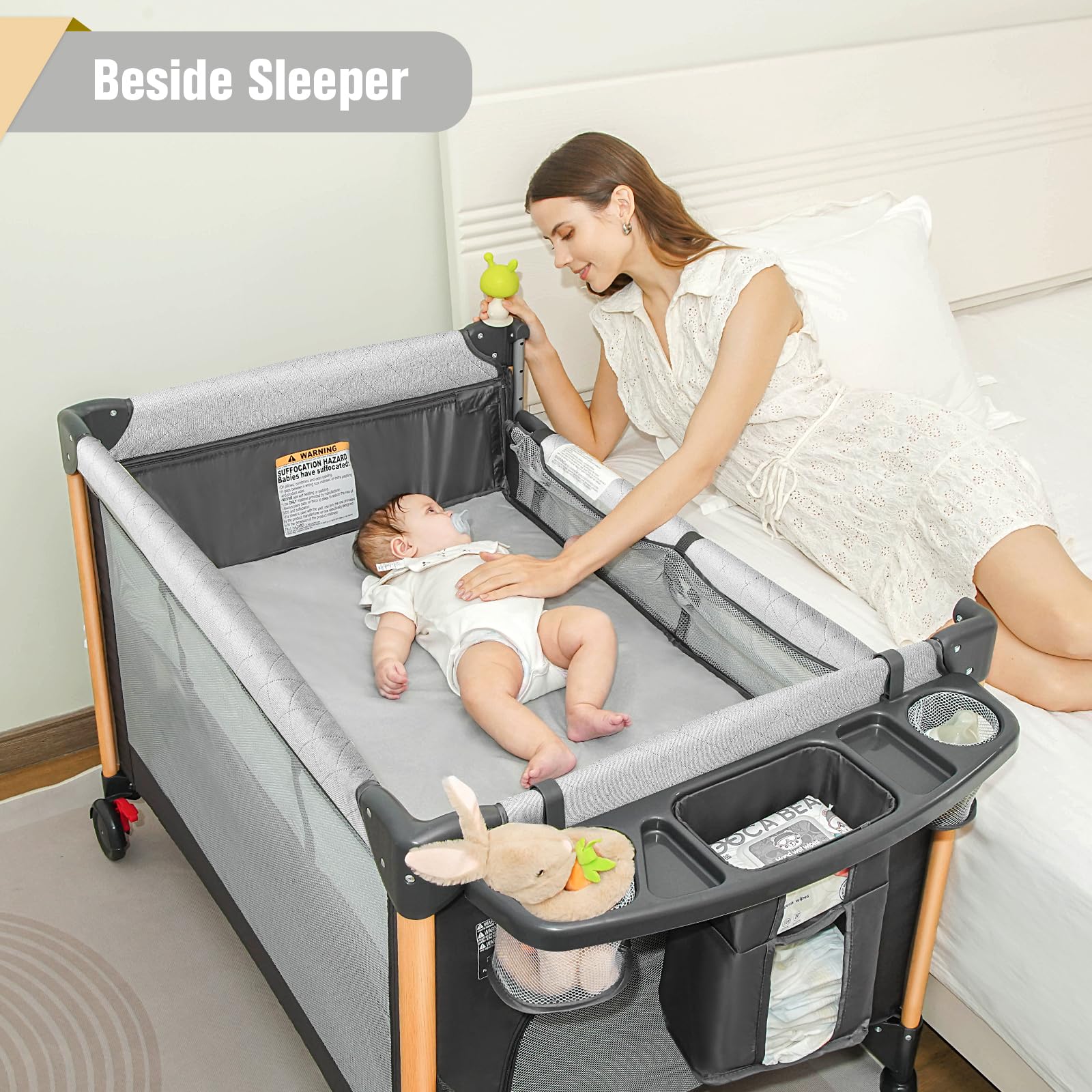Afgbf foldable playpen with mattress for portability.