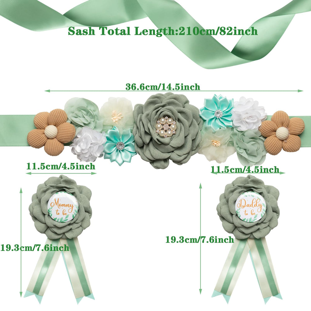 Afkengung mommy corsage complements the sash for coordinated gender reveal styling.