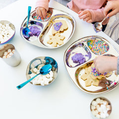 Unbreakable stainless steel plate by Ahimsa endures active toddlers' meals indoors or outdoors.
