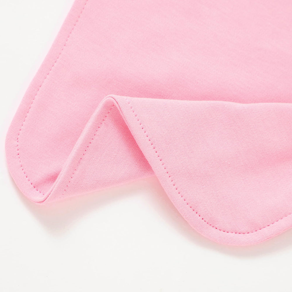 Aiden's Corner gift-ready birthday bib that brings smiles to baby photos.