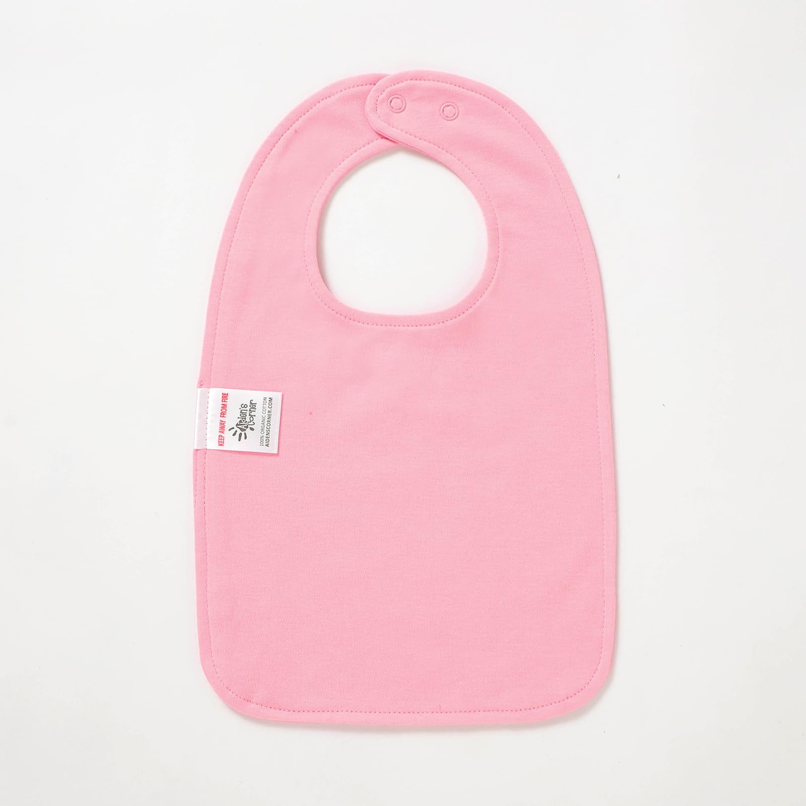 Aiden's Corner versatile bib for mealtime messes and birthday outfits.