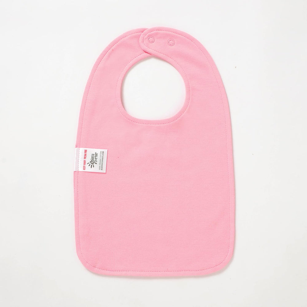 Aiden's Corner versatile bib for mealtime messes and birthday outfits.