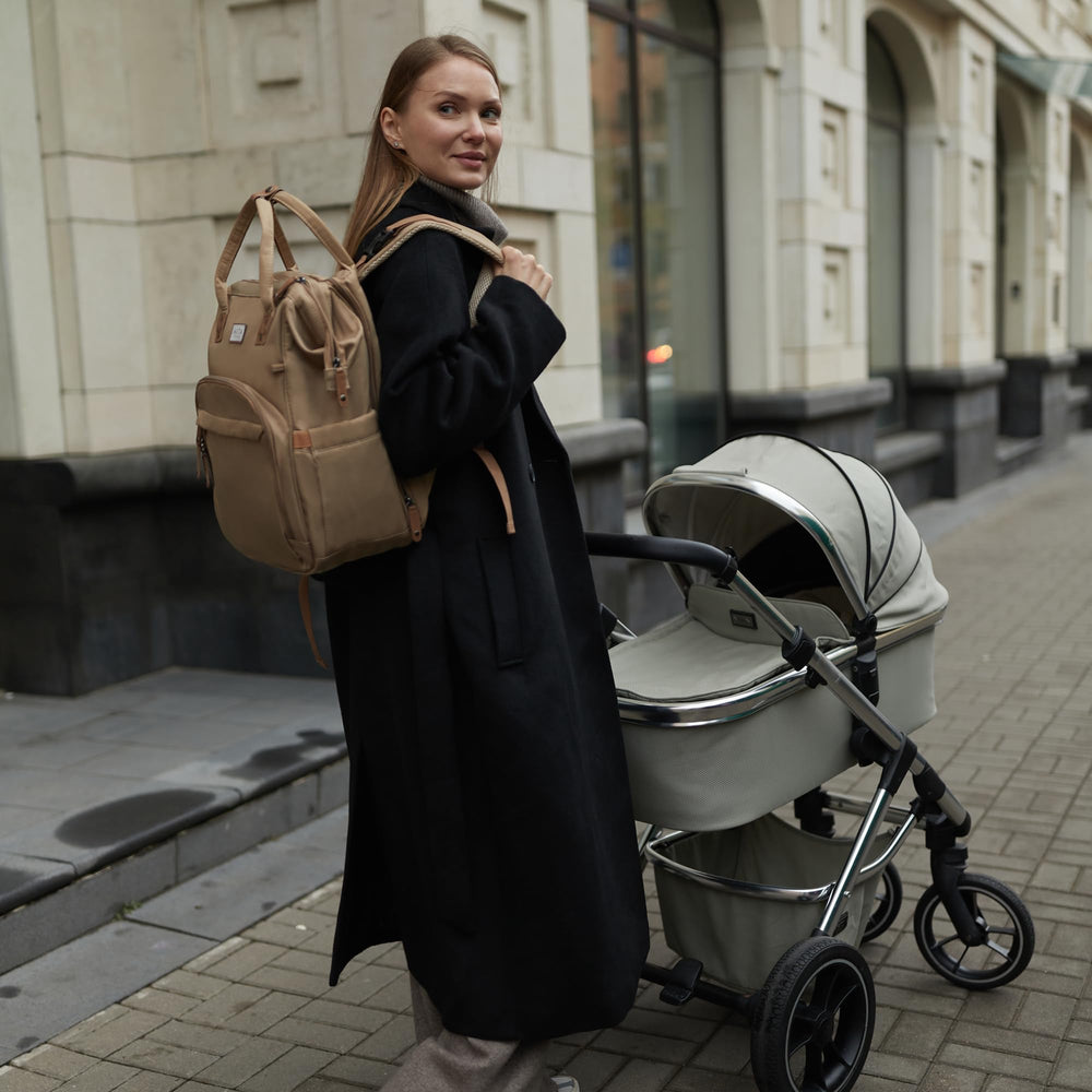 AIITA backpack includes stroller attachment straps for easy travel.
