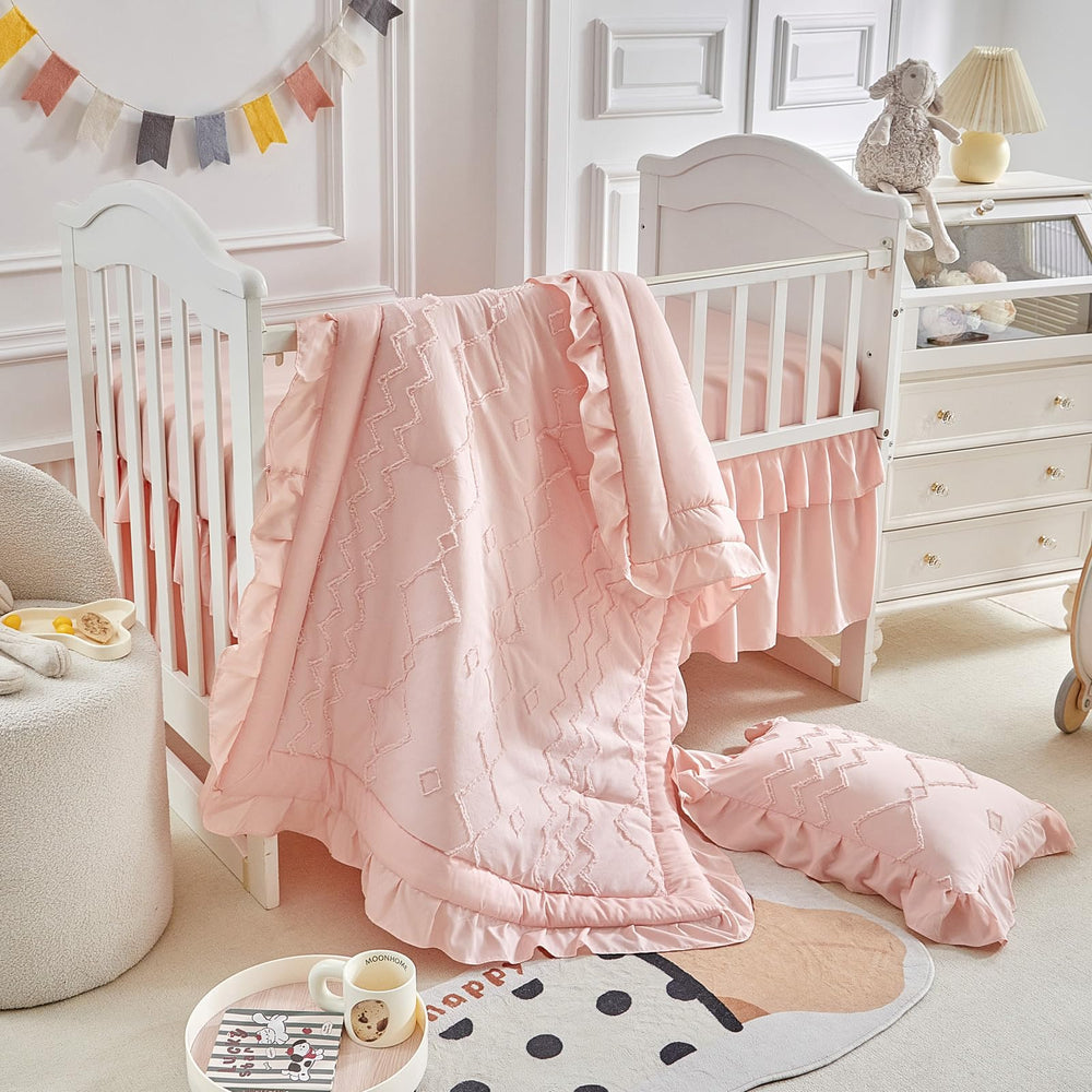 AIKASY crib pillowcase in coral pink supports a soft, cozy sleep surface.