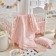 AIKASY crib pillowcase in coral pink supports a soft, cozy sleep surface.