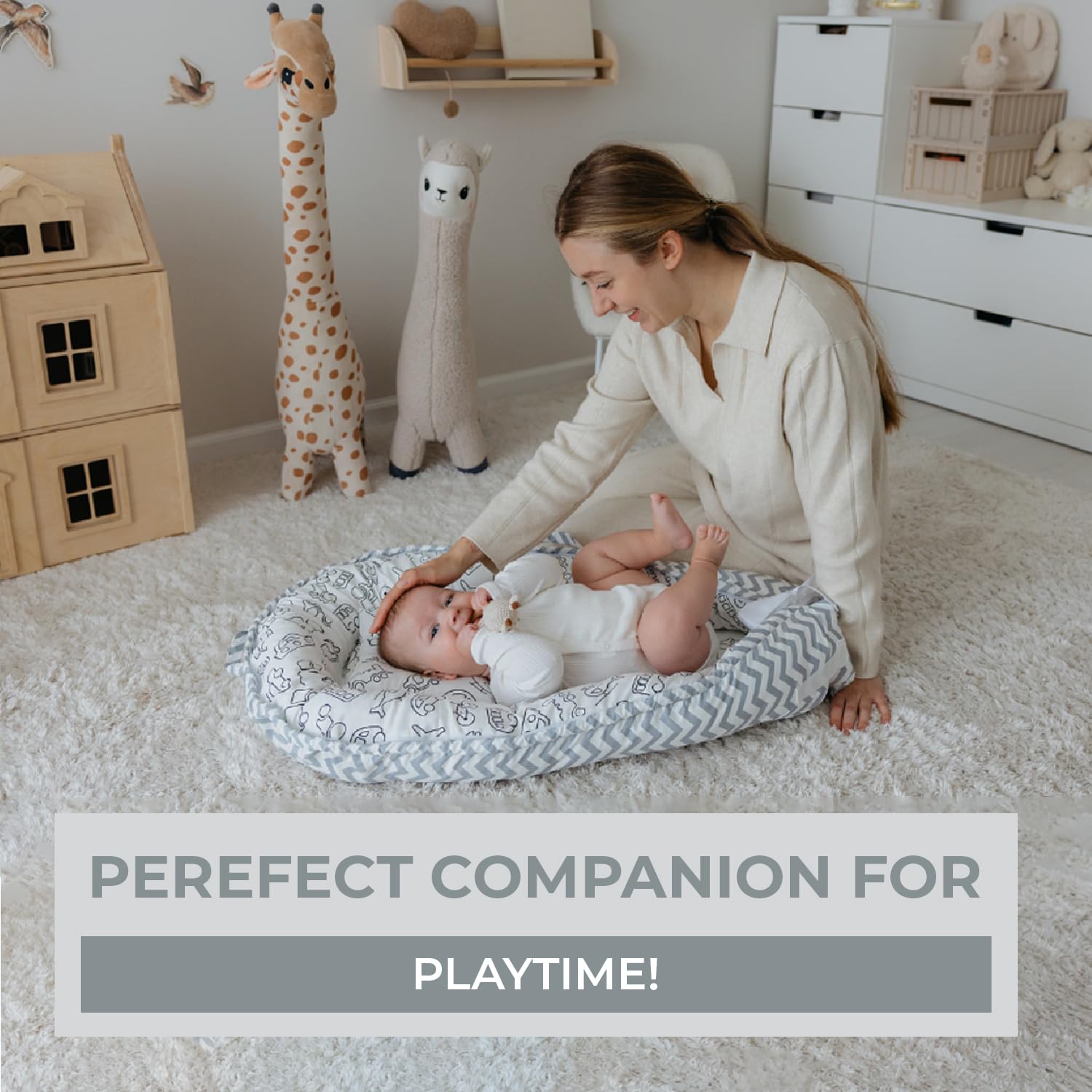 Aila+Aiden baby lounger in use during supervised tummy time and changes.