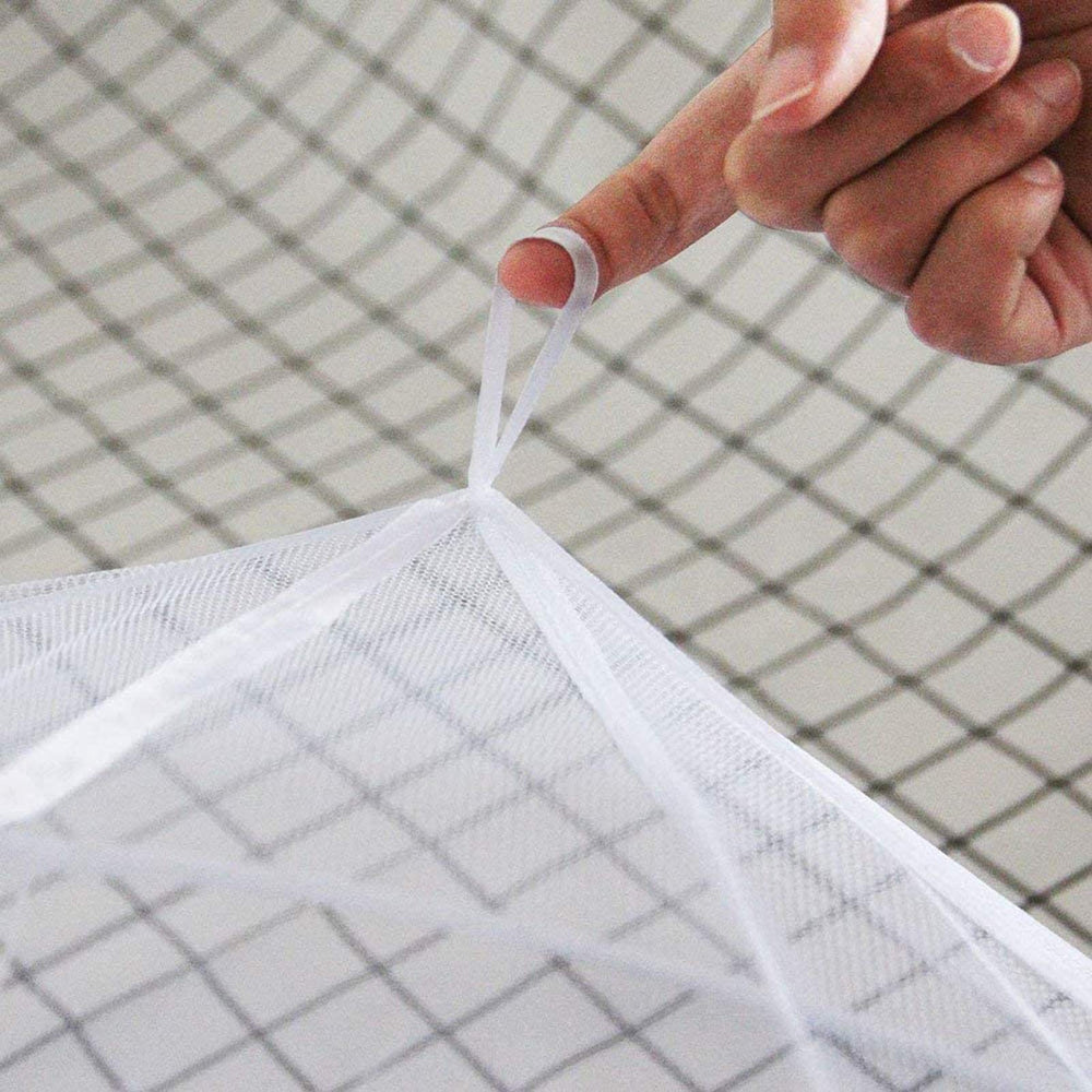 Ailelan fabric close-up shows lightweight polyester and breathable holes.