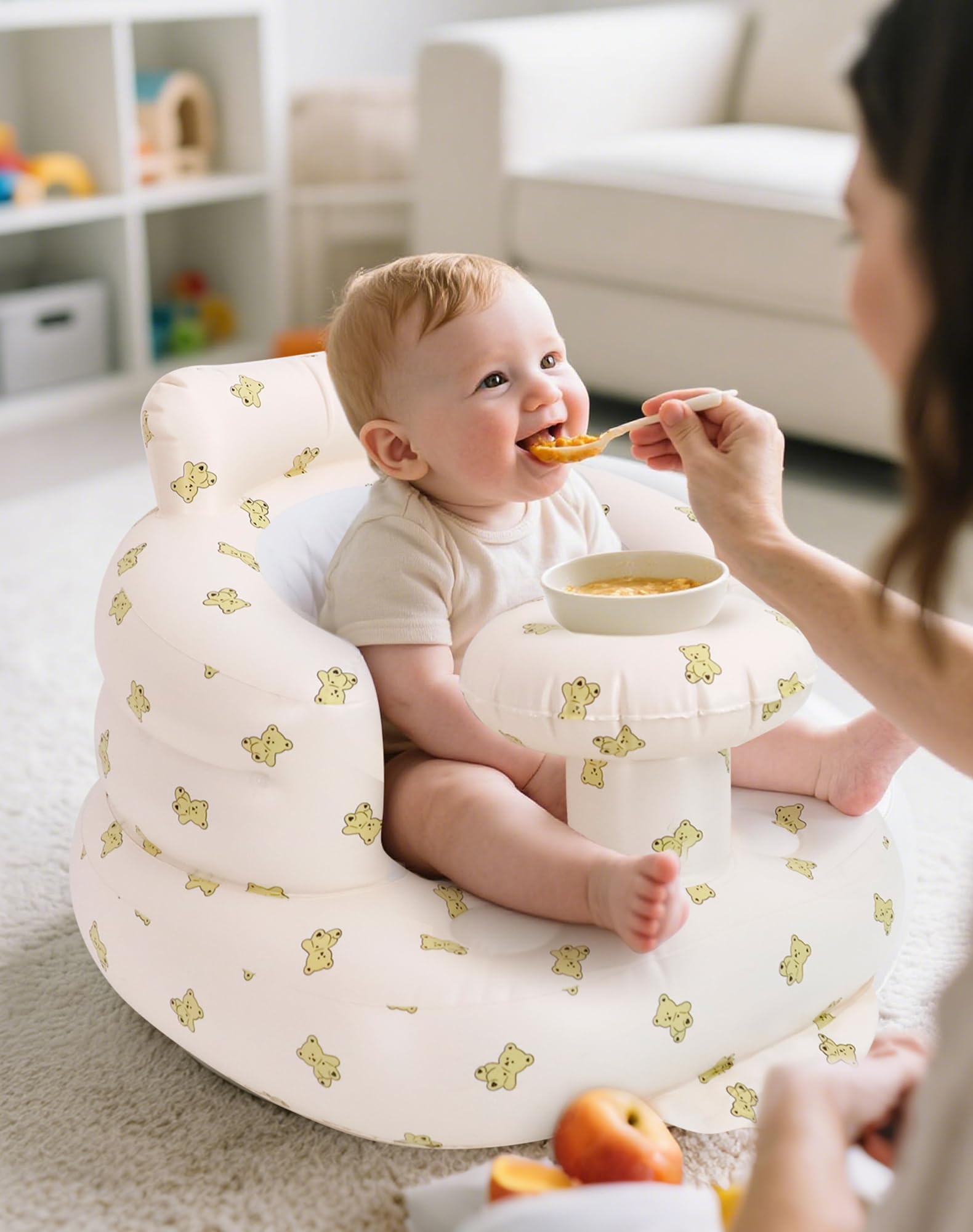 AirSwim baby seat tray holds bottles and toys during playtime.