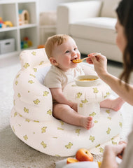 AirSwim baby seat tray holds bottles and toys during playtime.