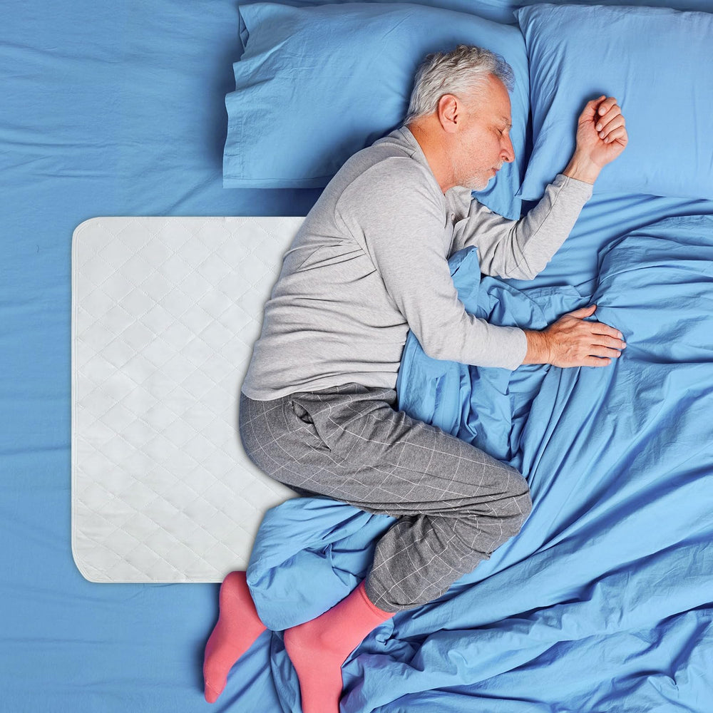Akicia XXL washable bed pad 34 by 52 inches protecting sheets from leaks