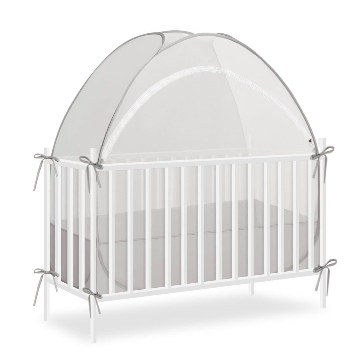 Akiky crib tent over a crib, fully opened for quick setup.