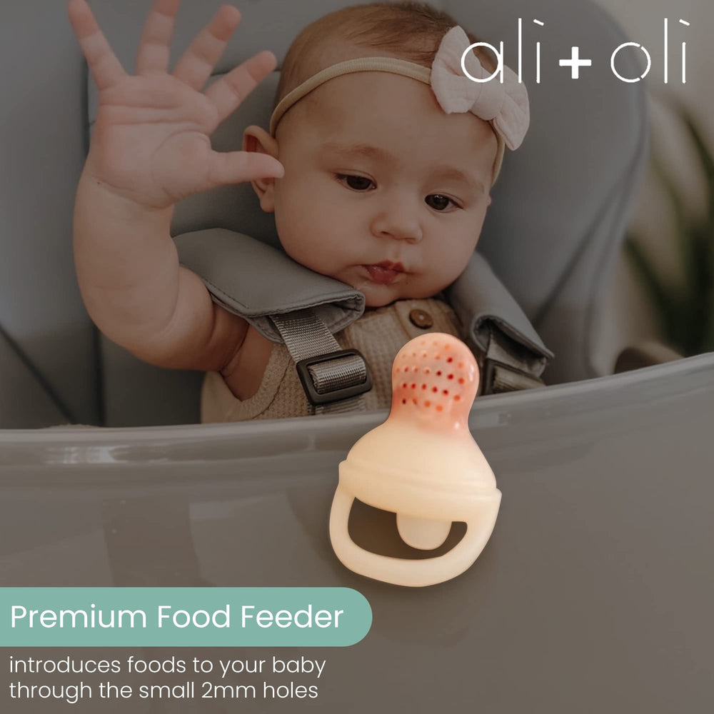 Ali+Oli 2mm-hole feeder controlling bite size for safer chewing.