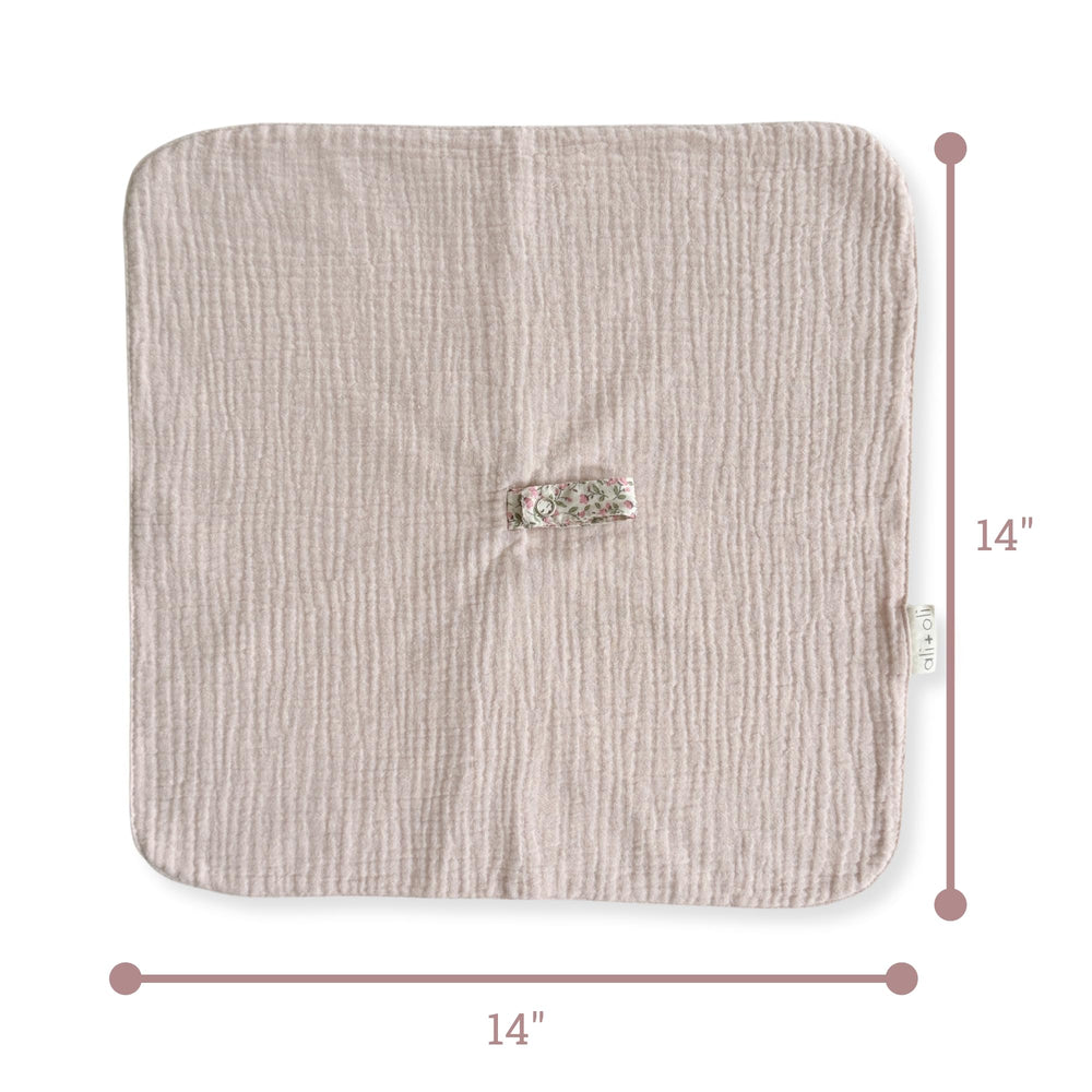Ali+Oli center fabric loop supports quick pacifier attachment for busy mornings.