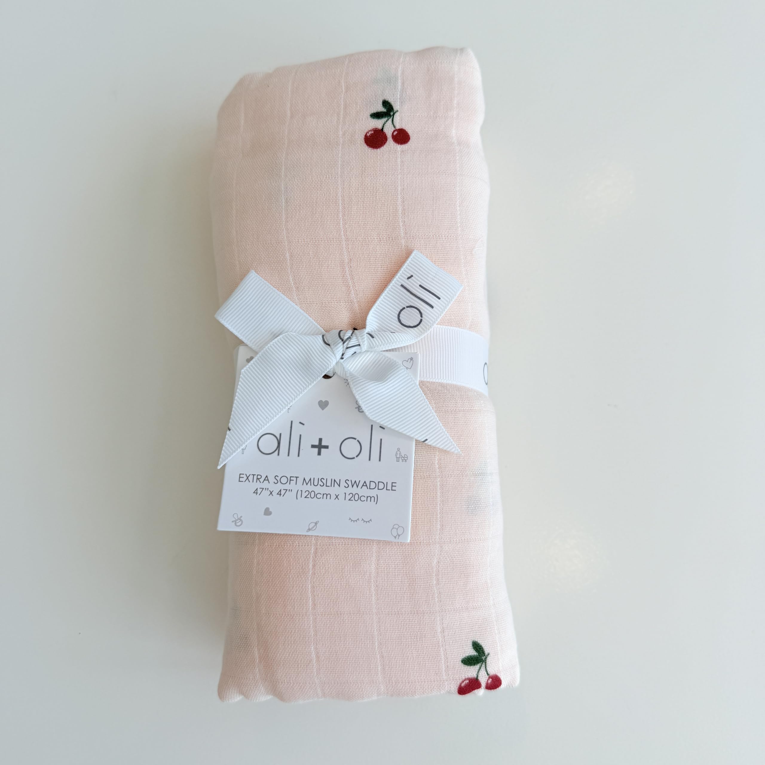Ali+Oli cherry swaddle makes a thoughtful baby shower gift.