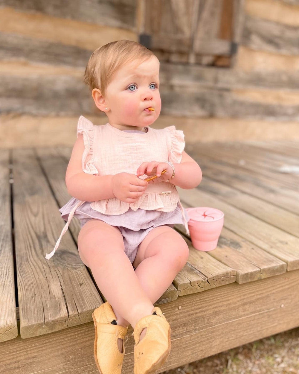 Ali+Oli Muslin Baby Bib is a practical gift for showers and new babies.