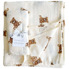 Ali+Oli swaddle blanket with teddy bear design, soft and breathable.