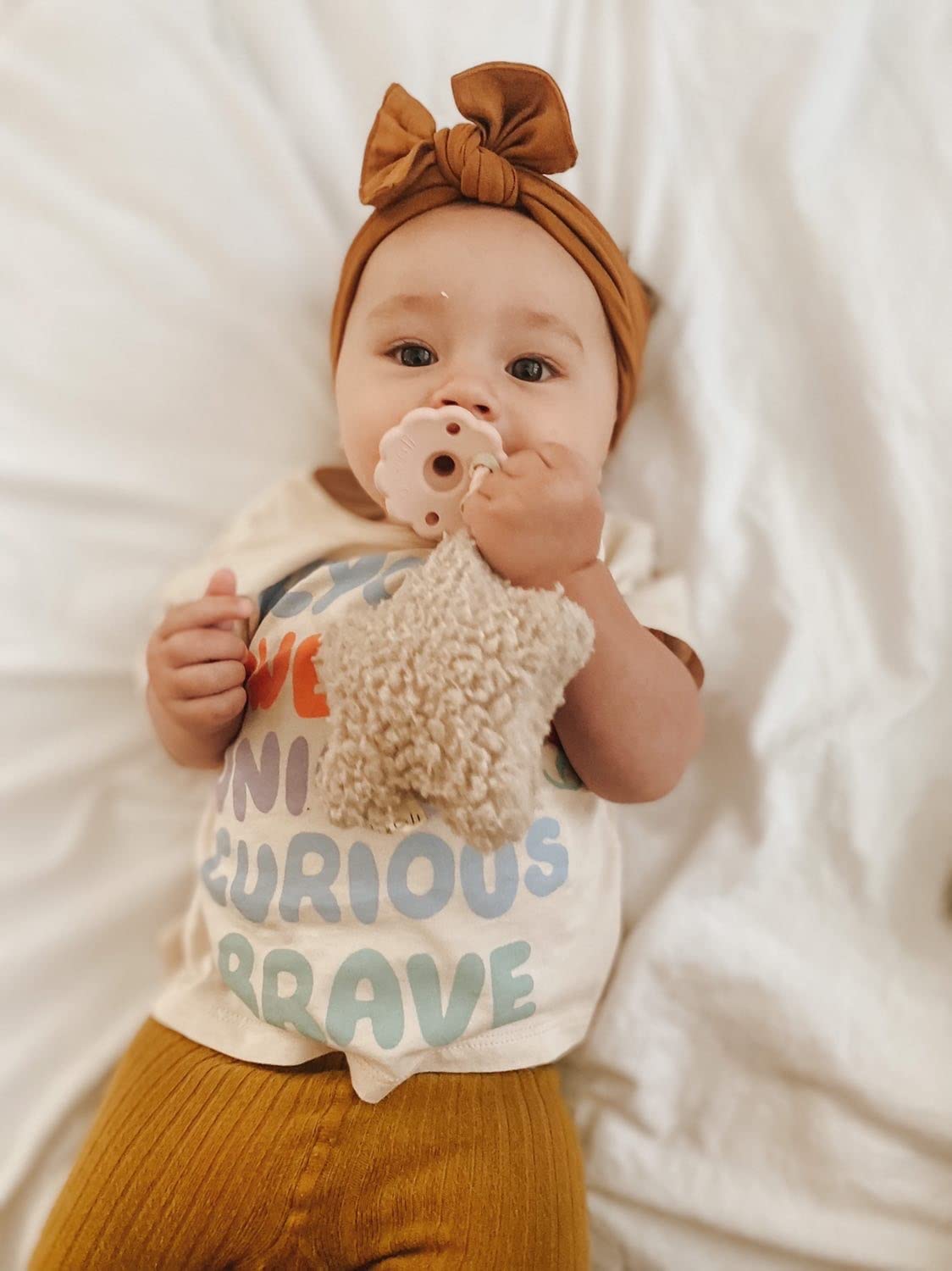 Ali+Oli clip-ready pacifiers fit most holders.