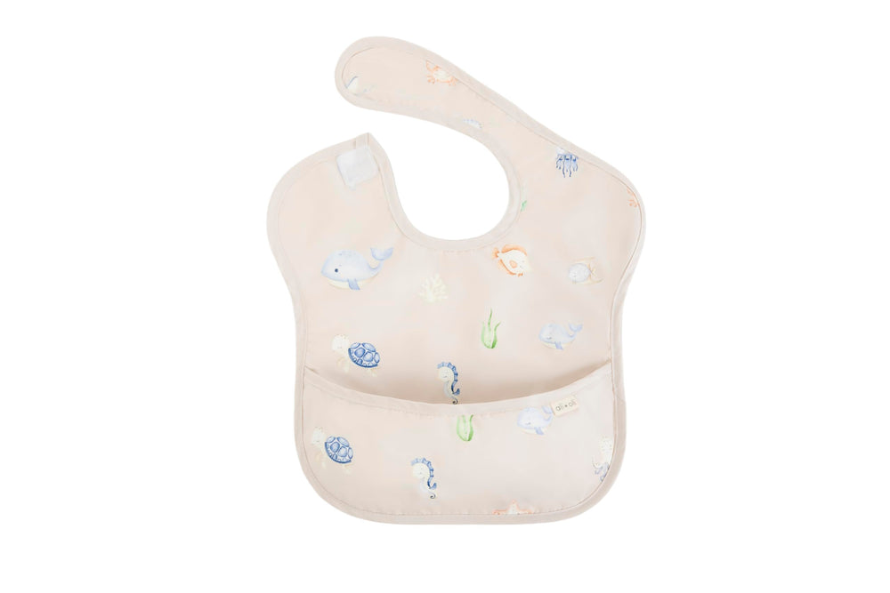 Ali+Oli Smock Bib, sleeveless design fits toddlers during feeding.