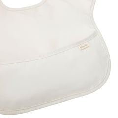 Ali+Oli smock bib on travel bag demonstrates compact design