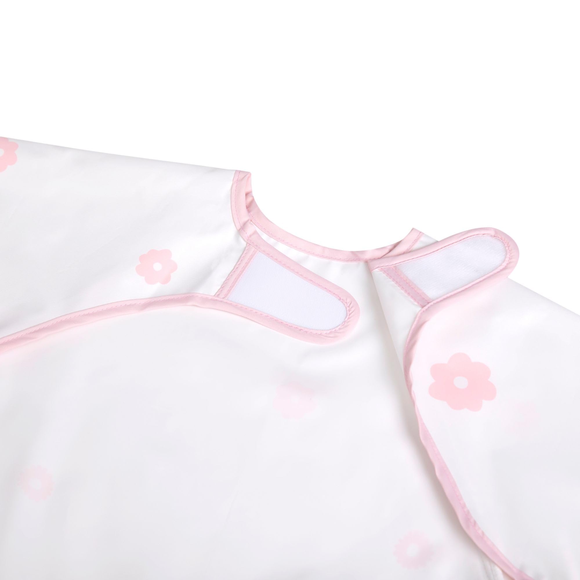 Ali+Oli machine-washable bib for quick cleanup.