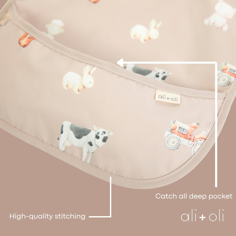 Ali+Oli Smock Bib folded for compact travel