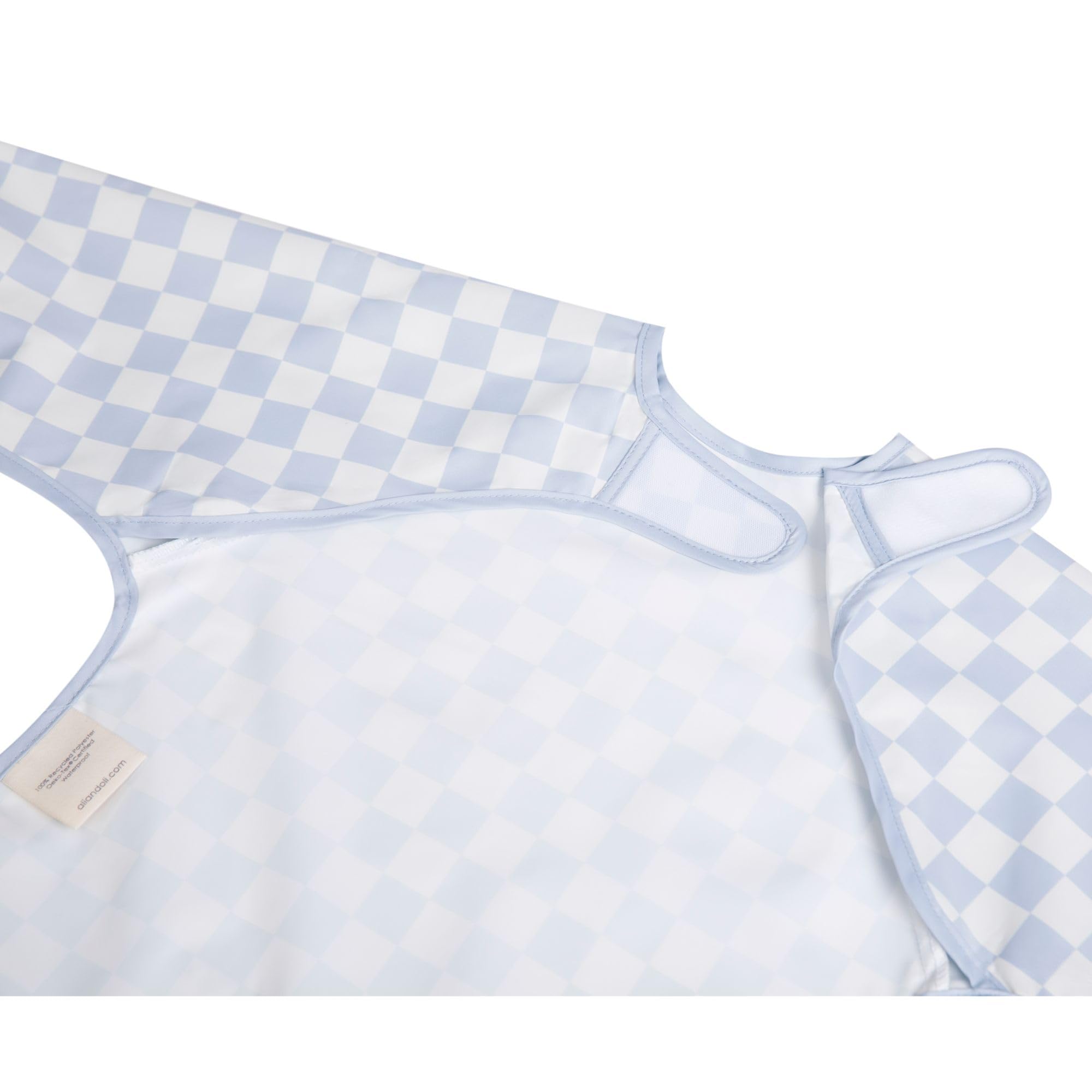 Ali+Oli blue checkers smock bib long-sleeve fit on toddler.