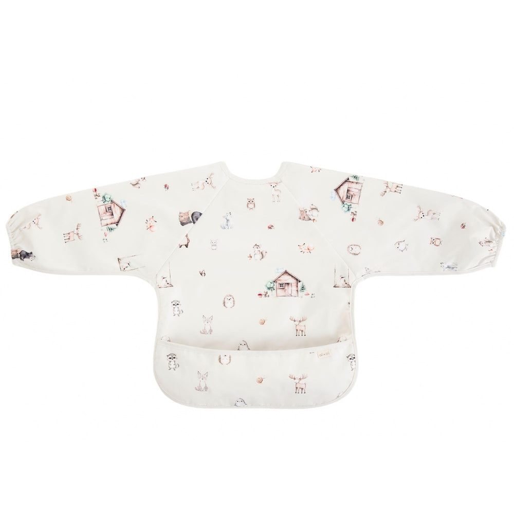 Ali+Oli Smock Bib in Scandinavian colors complements modern nurseries.