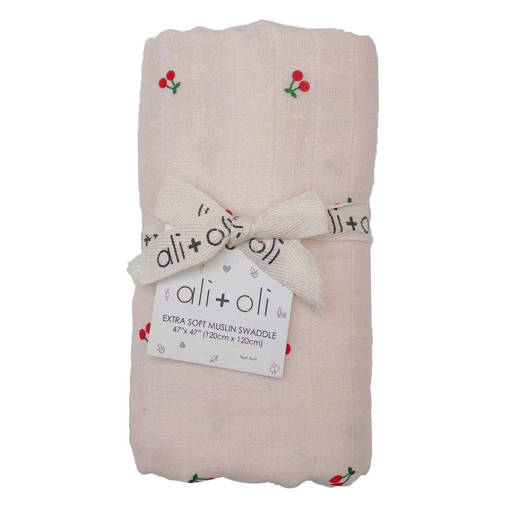 Ali+Oli swaddle cherry close-up highlights soft texture ideal for soothing naps.