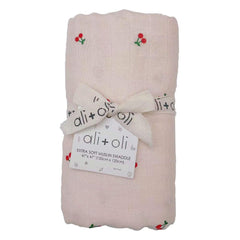 Ali+Oli swaddle cherry close-up highlights soft texture ideal for soothing naps.