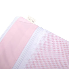 Ali+Oli water-resistant material protects belongings during stroller outings.