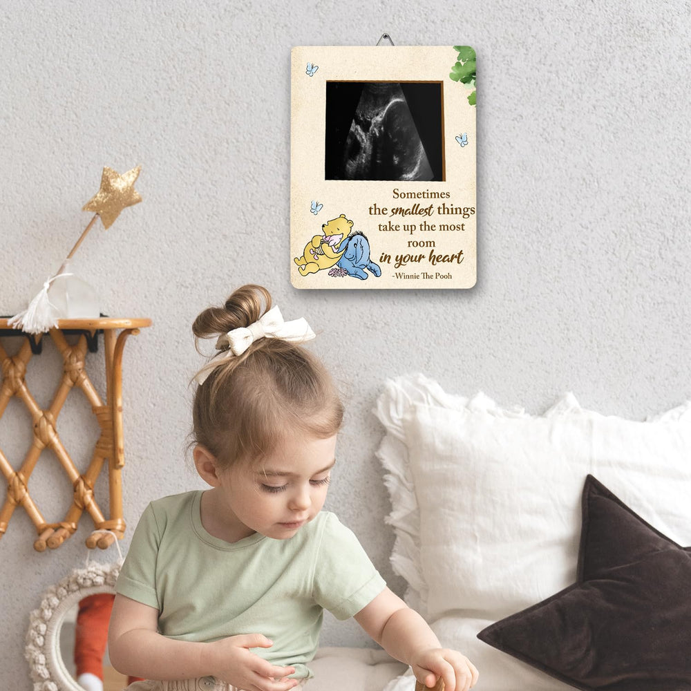 ALodr Winnie measuring tape bump frame adds playful milestones.