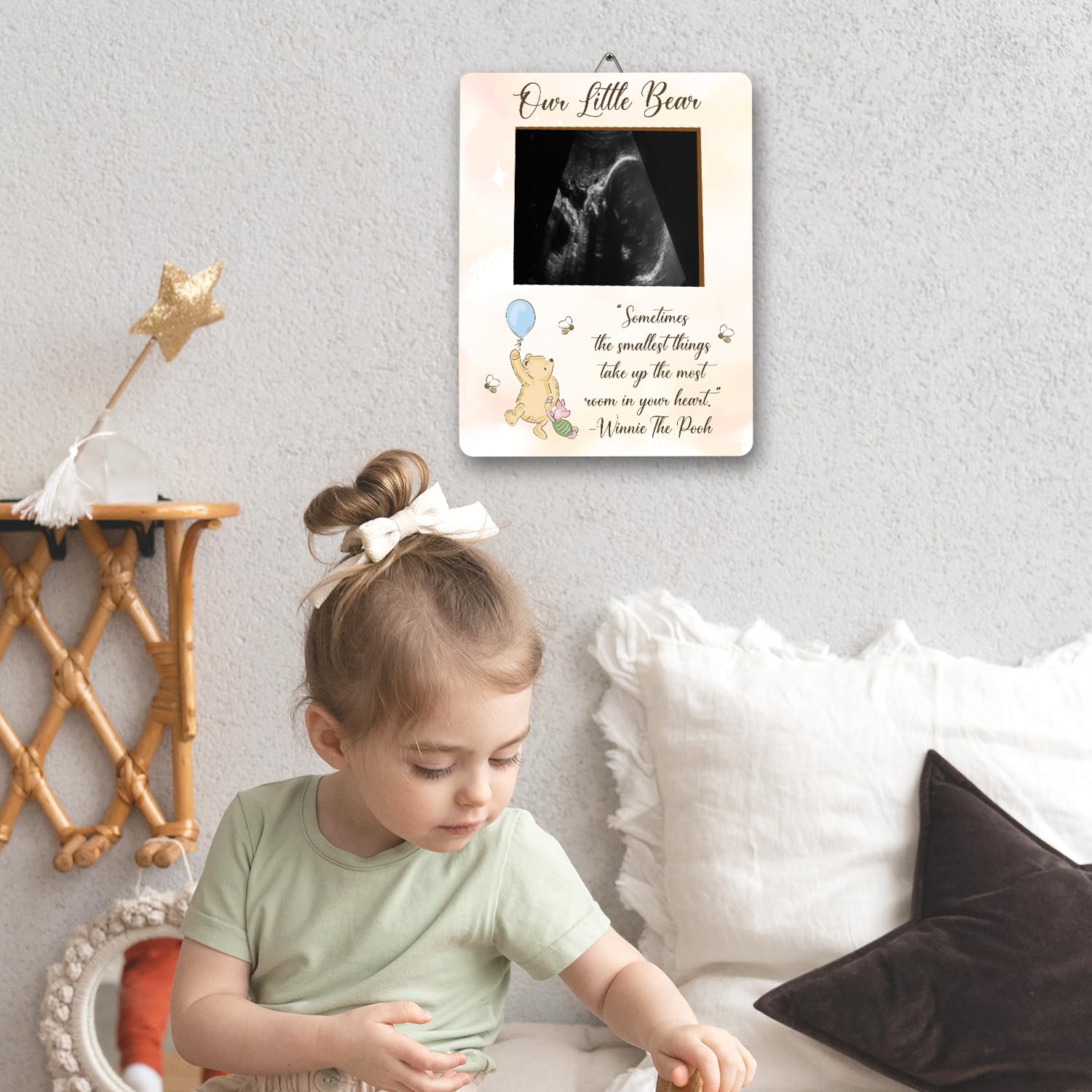 ALodr Winnie frame includes a measuring tape for playful bump measurements.