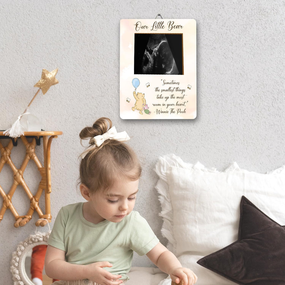 ALodr Winnie frame includes a measuring tape for playful bump measurements.