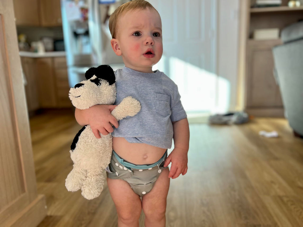 ALVA diaper cover with elastic legging area to reduce leaks