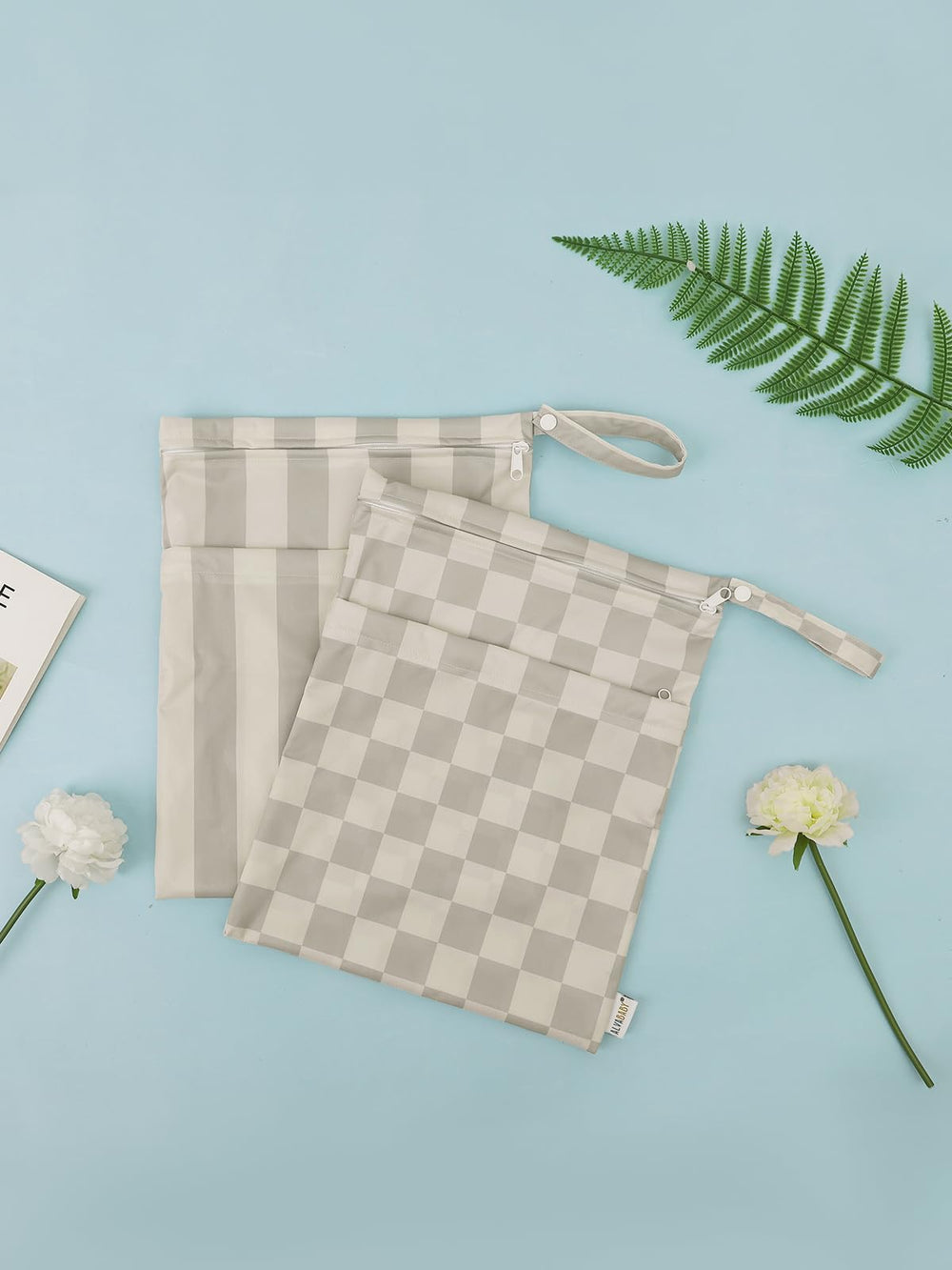 ALVABABY carrying handle attached to bag