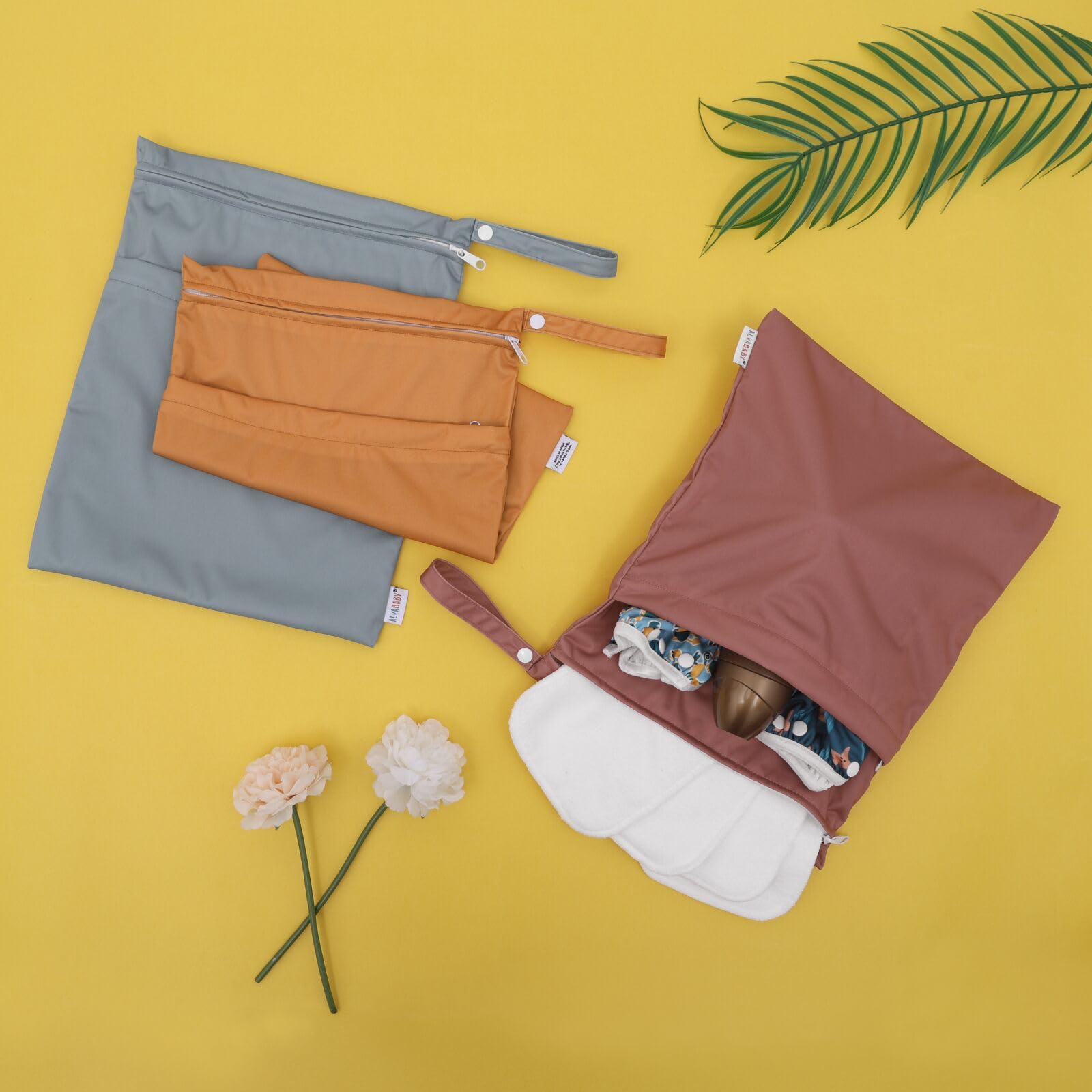 ALVABABY 3pc bag versatile for diapers, cosmetics, or gym items.