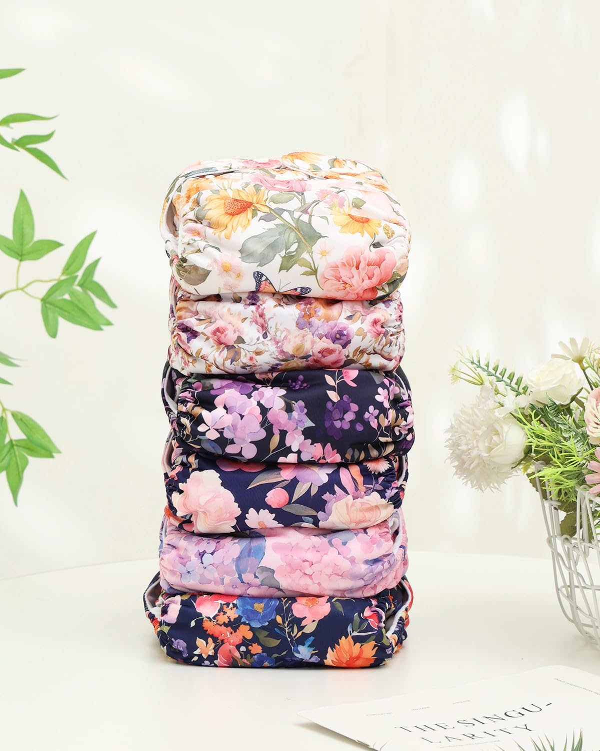 ALVABABY adjustable one-size diaper with snap closures.