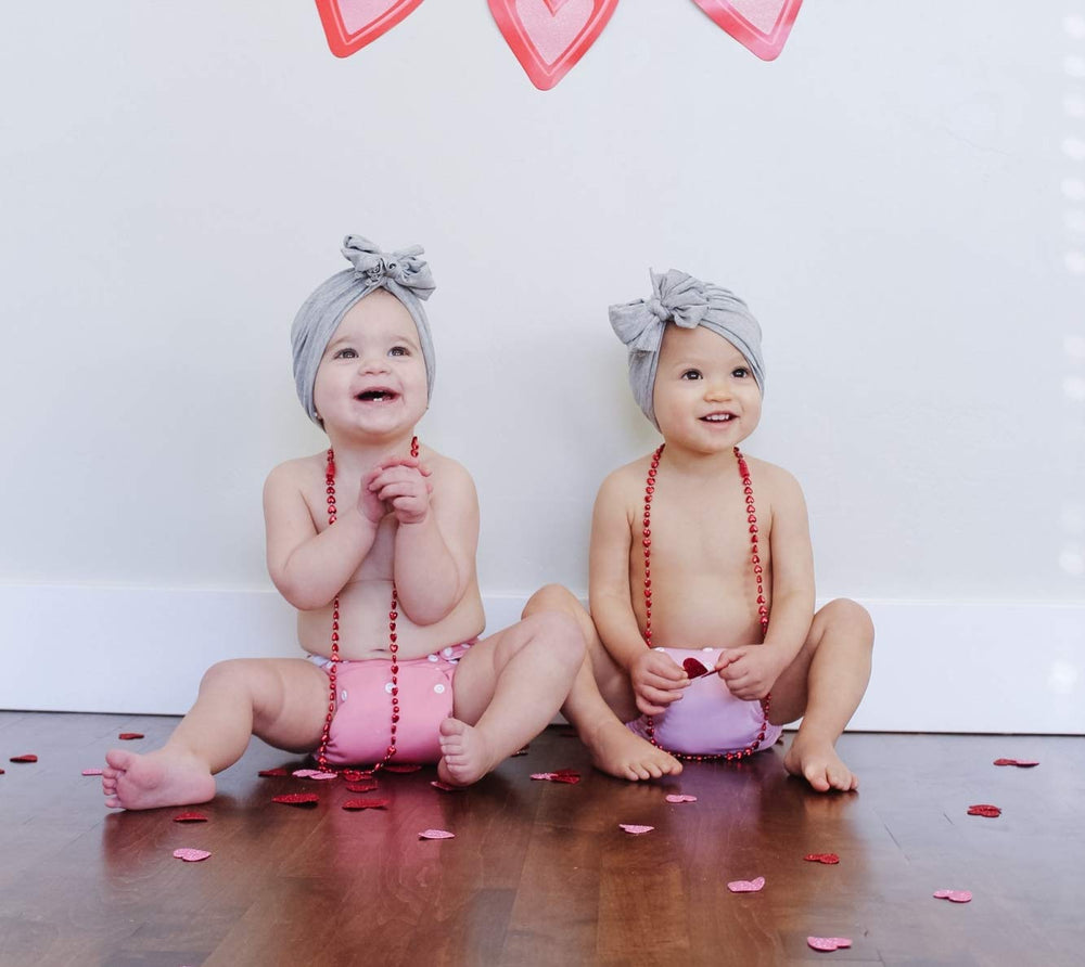 ALVABABY hip and crossover snaps prevent wing droop