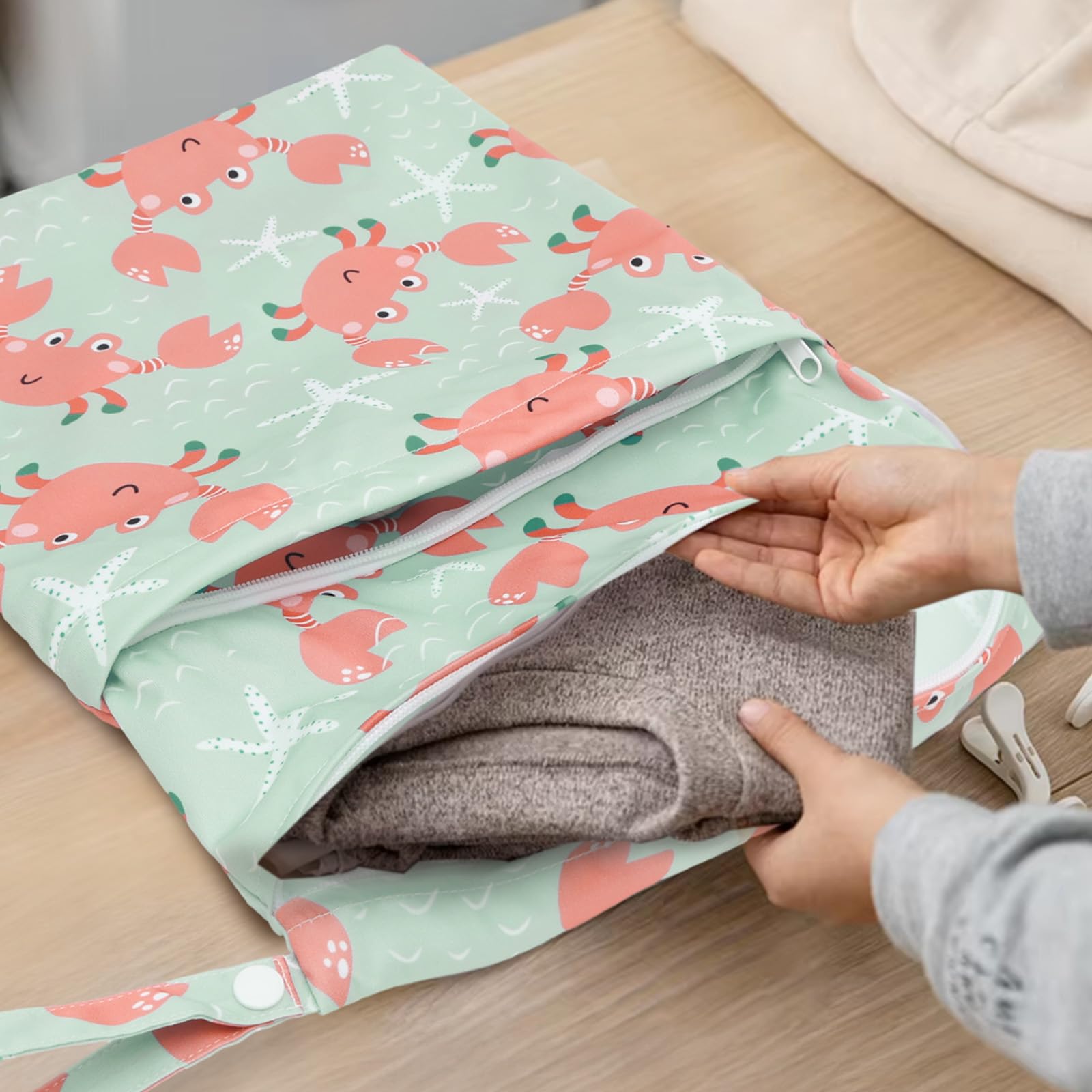 ALVABABY durable wet-dry bag keeps diapering supplies tidy on daycare days.