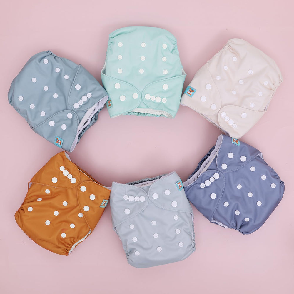 ALVABABY pack includes six diapers and twelve inserts for versatile use.